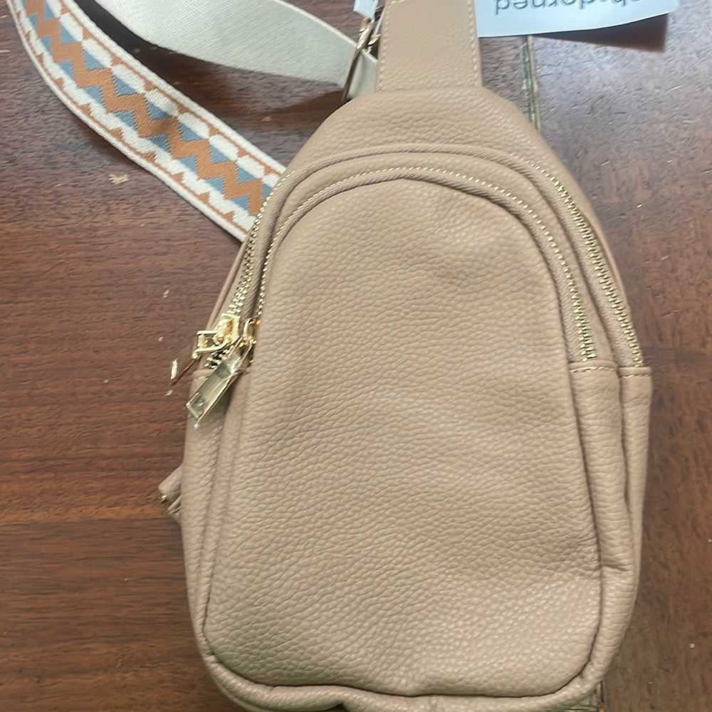 Ah dorned tan crossbody bag
